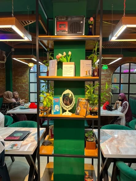 Decor shelf with books and plants